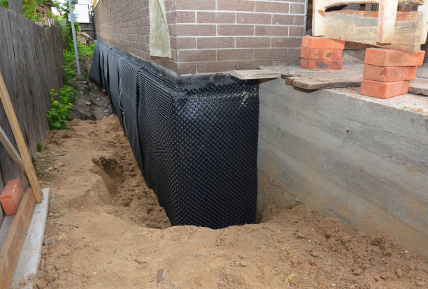 SJ Waterproofing Pros technician performing targeted Waterproofing assessment in Linwood, NJ